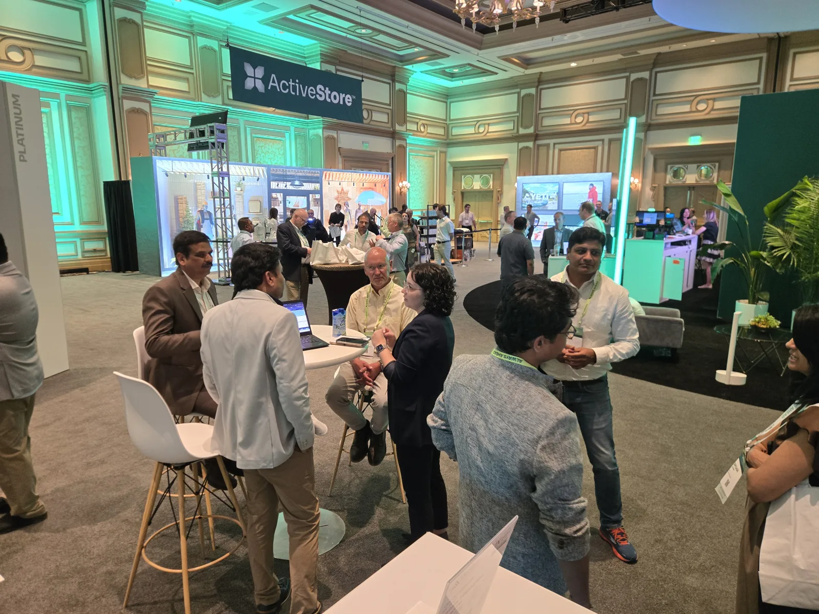 Everest Technologies team meeting attendees at the Manhattan Momentum 2026 booth